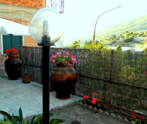 Отель Casa Vacanze con giardino  Петтинео